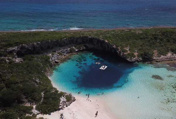  Dean's Blue Hole is a blue hole located in The Bahamas in a bay west of Clarence Town on Long Island